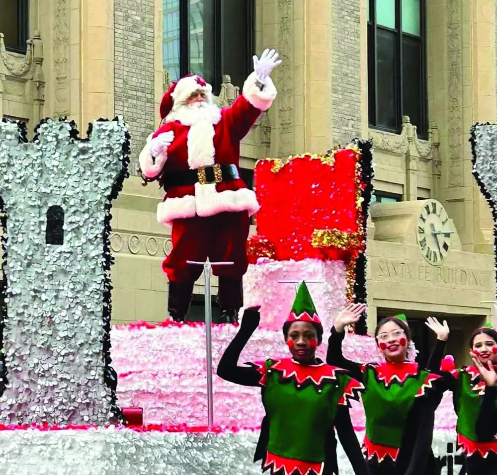 Mitch Allen dressed as Santa in the Dallas Holiday Parade.